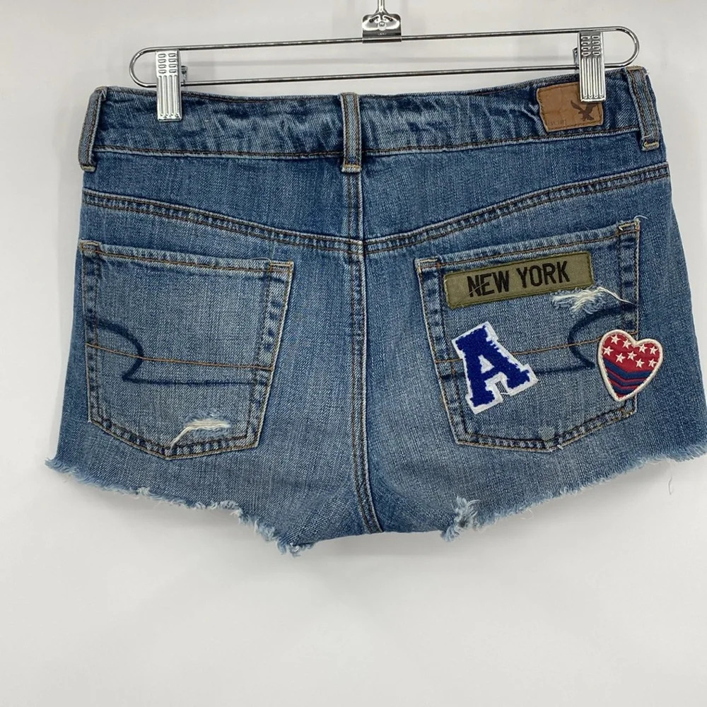 American Eagle Outfitters Booty Shorts Women Sz 6 Blue Patches Distressed Denim